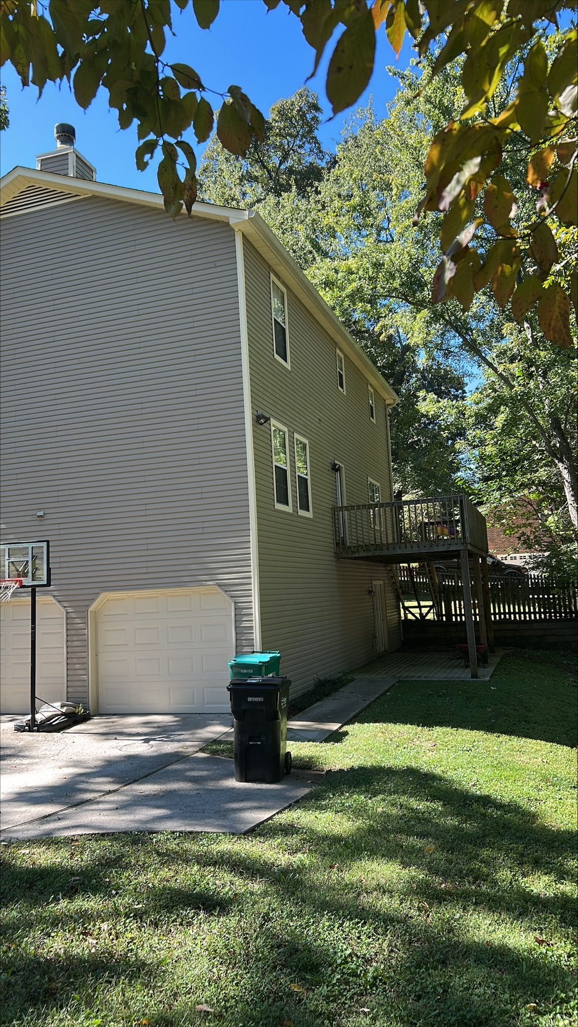 back of home and slope in yard