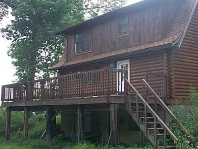 front of house with wrap around porch
