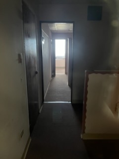 Picture into the office showing light from window