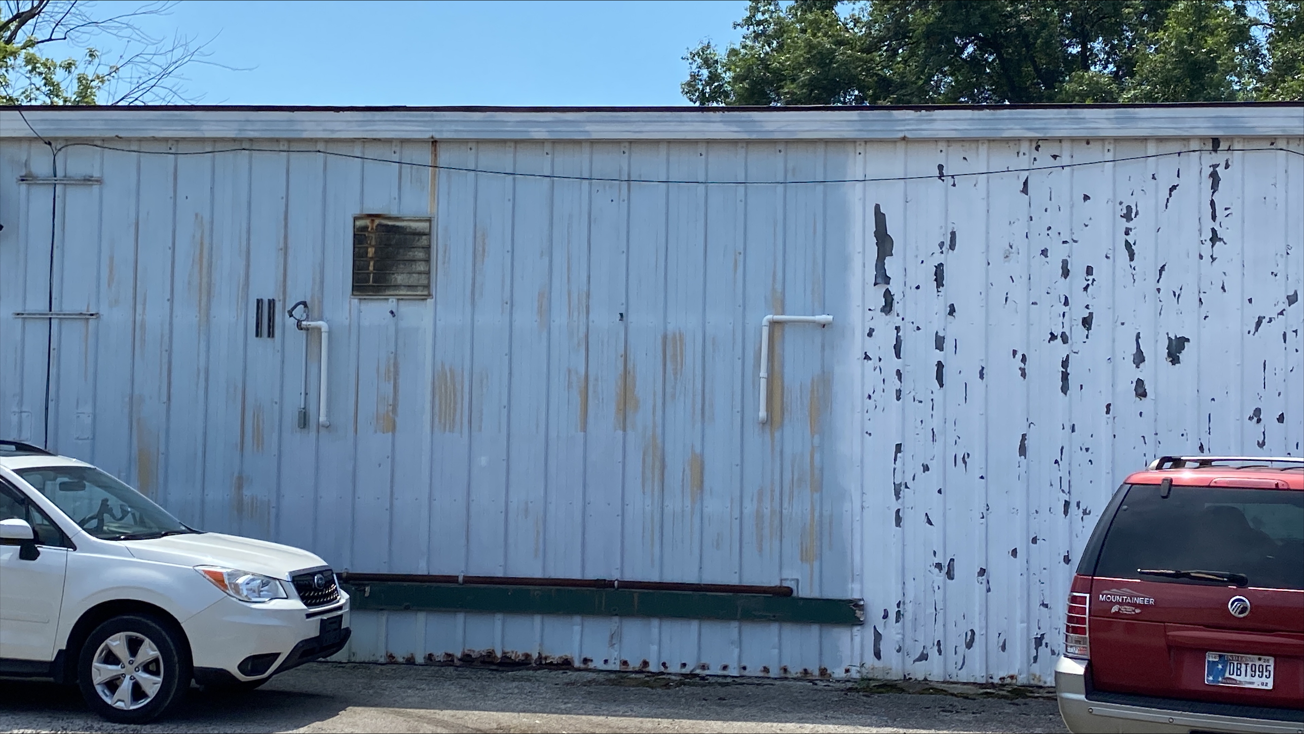 Back view of white garage