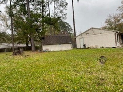 Side view of house showing shed