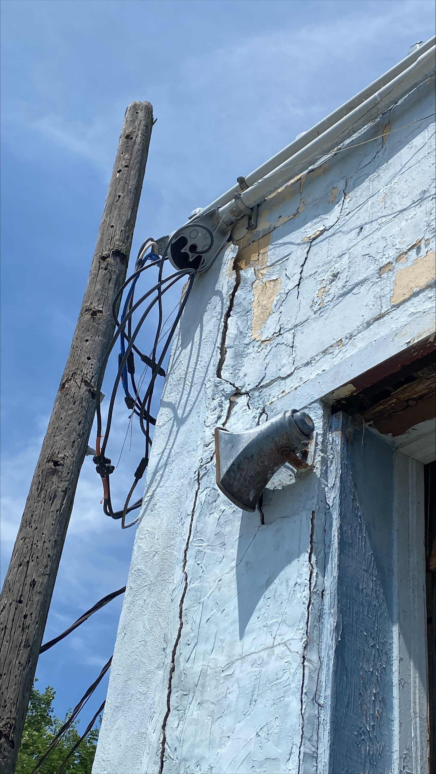 Top left side of blue building