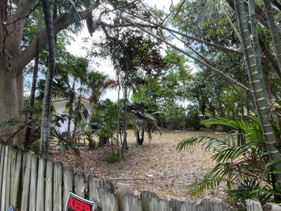 View of backyard over a fence