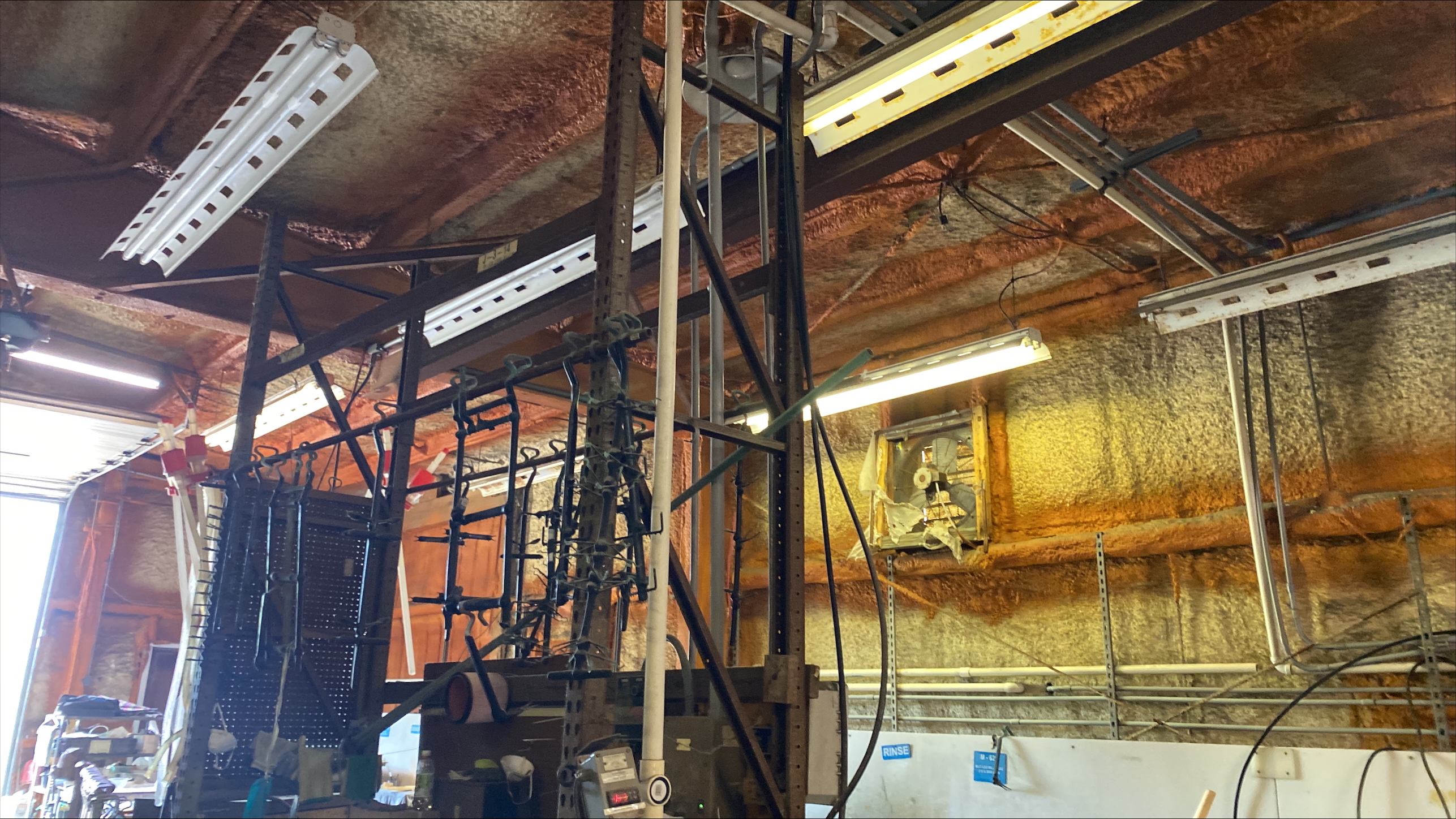 View of ceiling in 1 of the garages