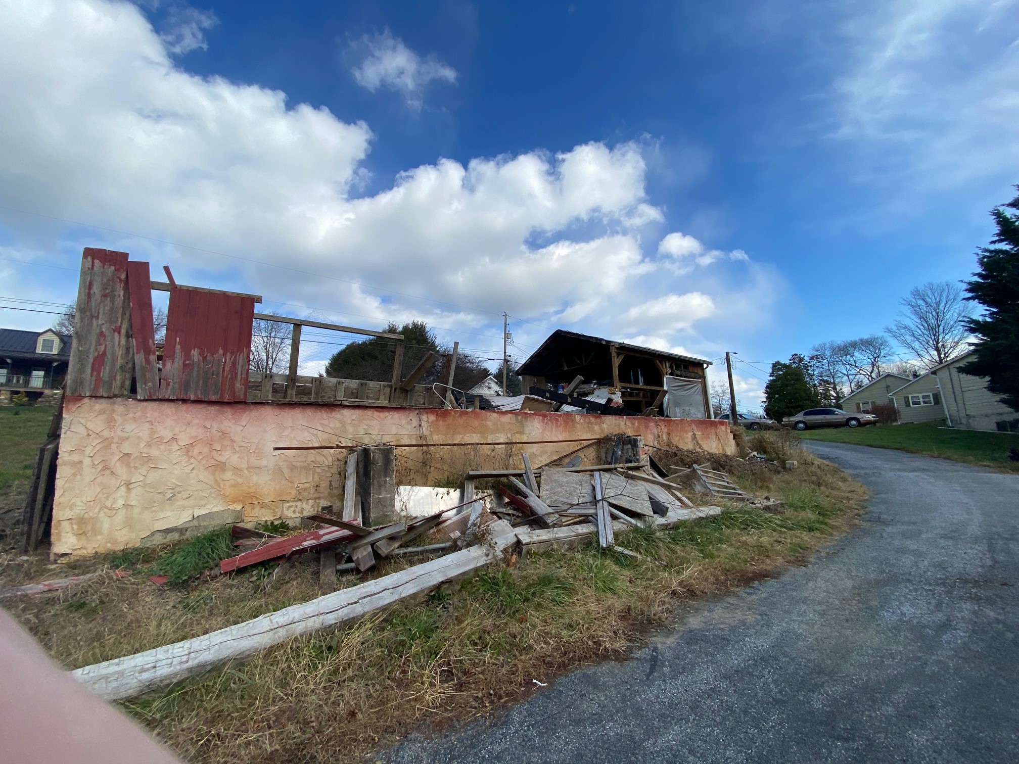 Dilapidated building near the entrance of the driveway