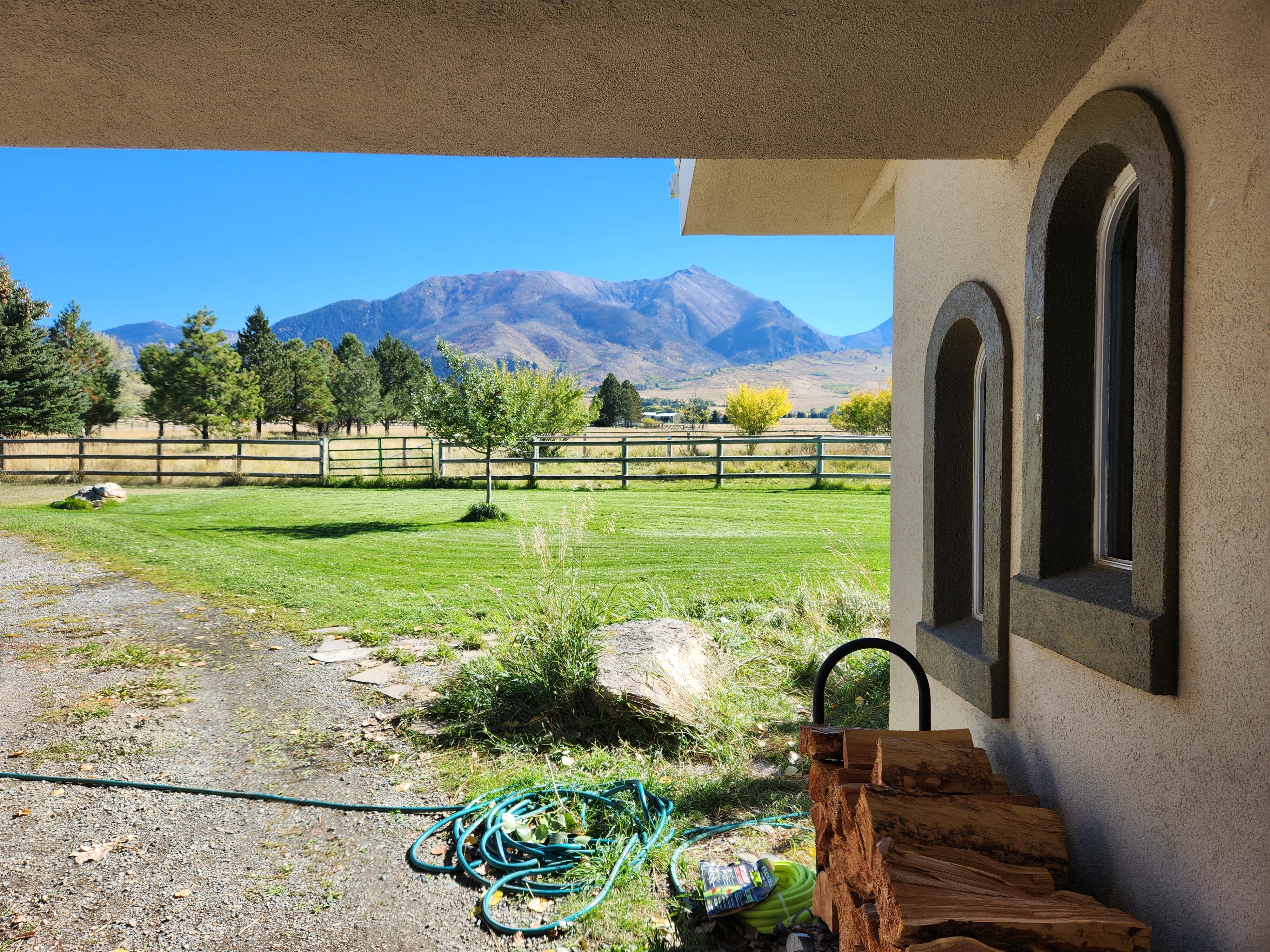 Looking to right side of house under carport