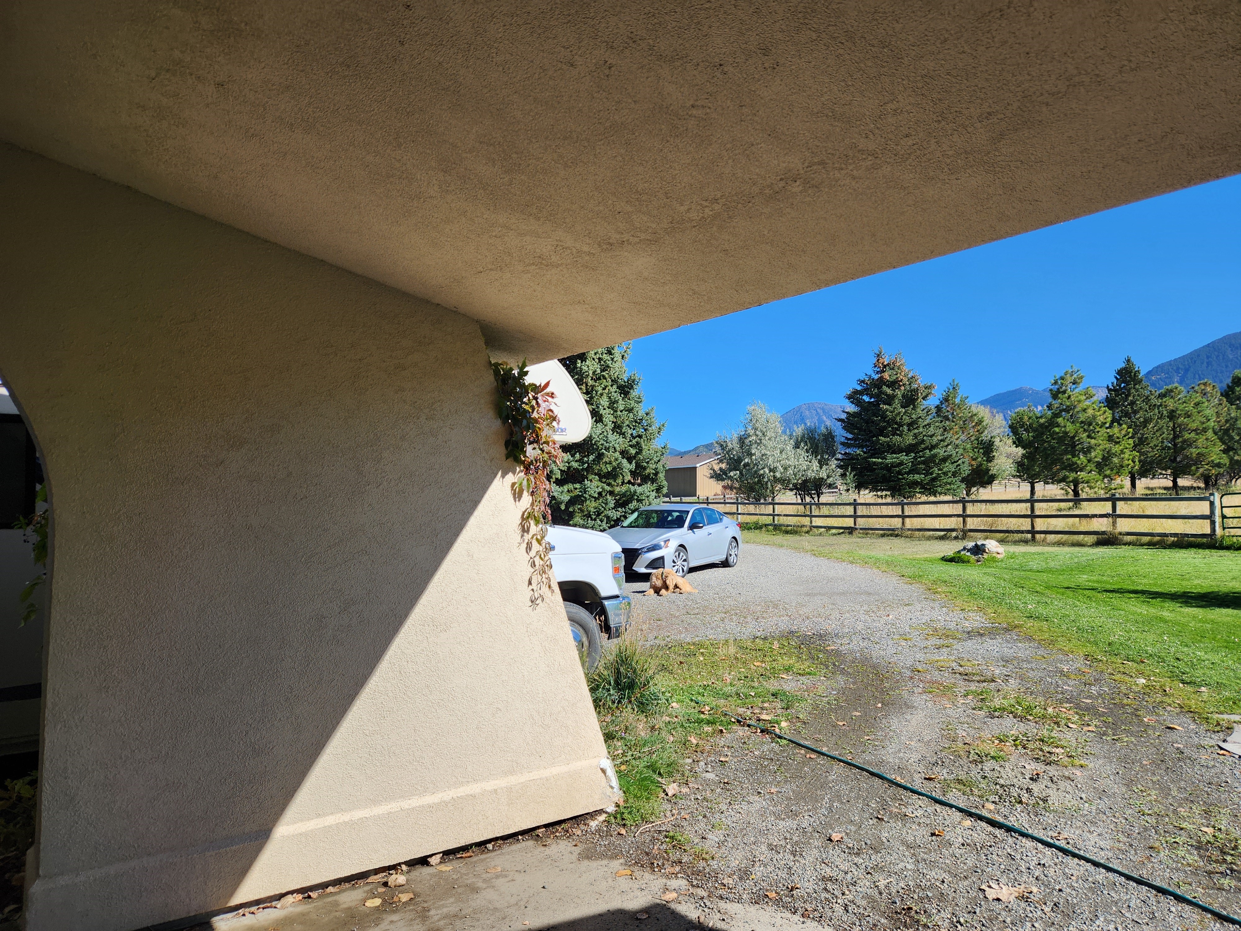 Looking to the road from under the carport