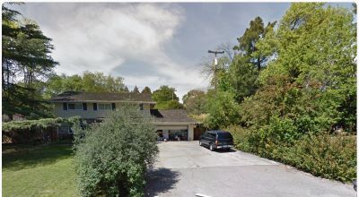 Street view of driveway to the home.