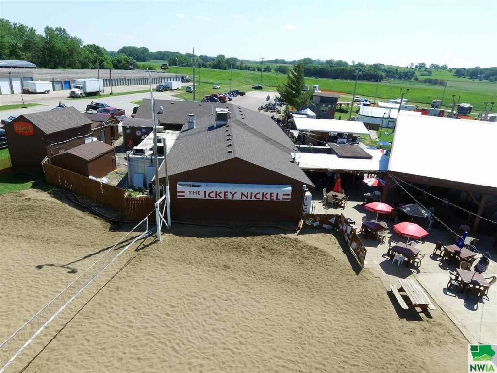 Back of building showing volleyball court