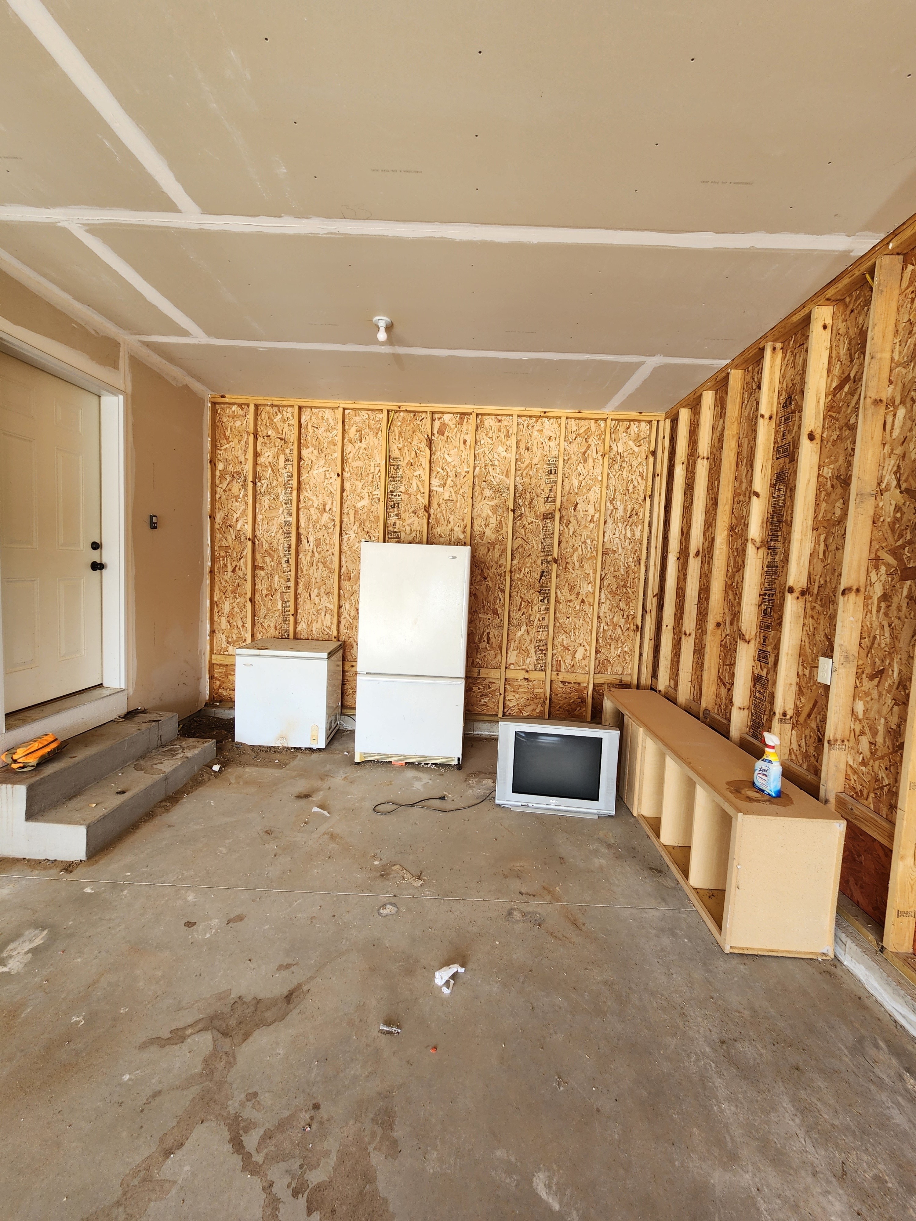 back section of garage from laundry room