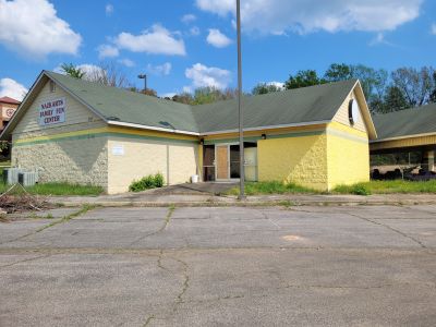 2,180 sq. ft. commercial building, used as an arcade, built in 2004 situated on 1.58 acre more commonly known as 203 N. Cooper Dr., Henderson, NC 27536. Parcel No. 0033A01001
