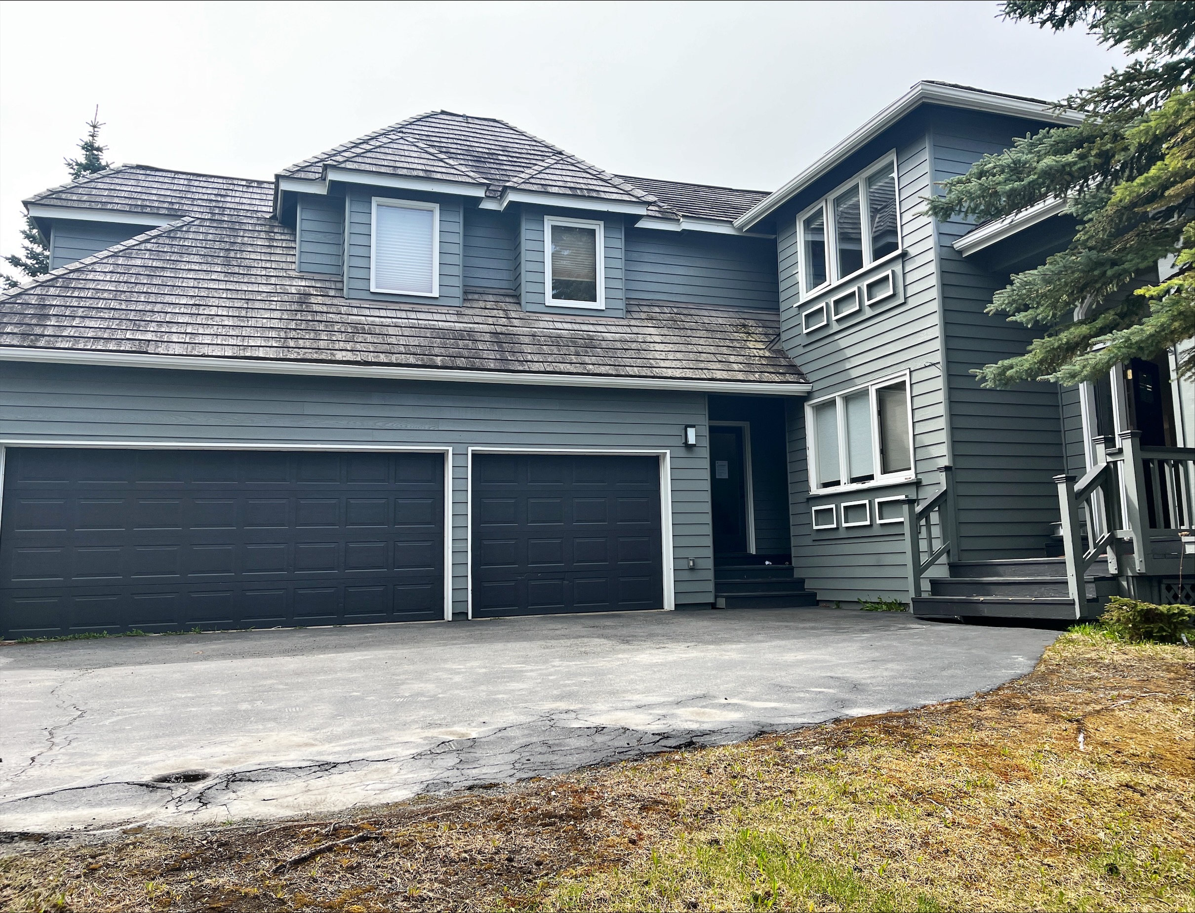 attached 2 car and 1 car garage