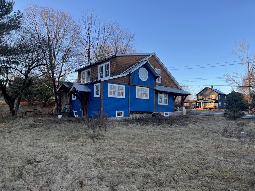 side and back of home