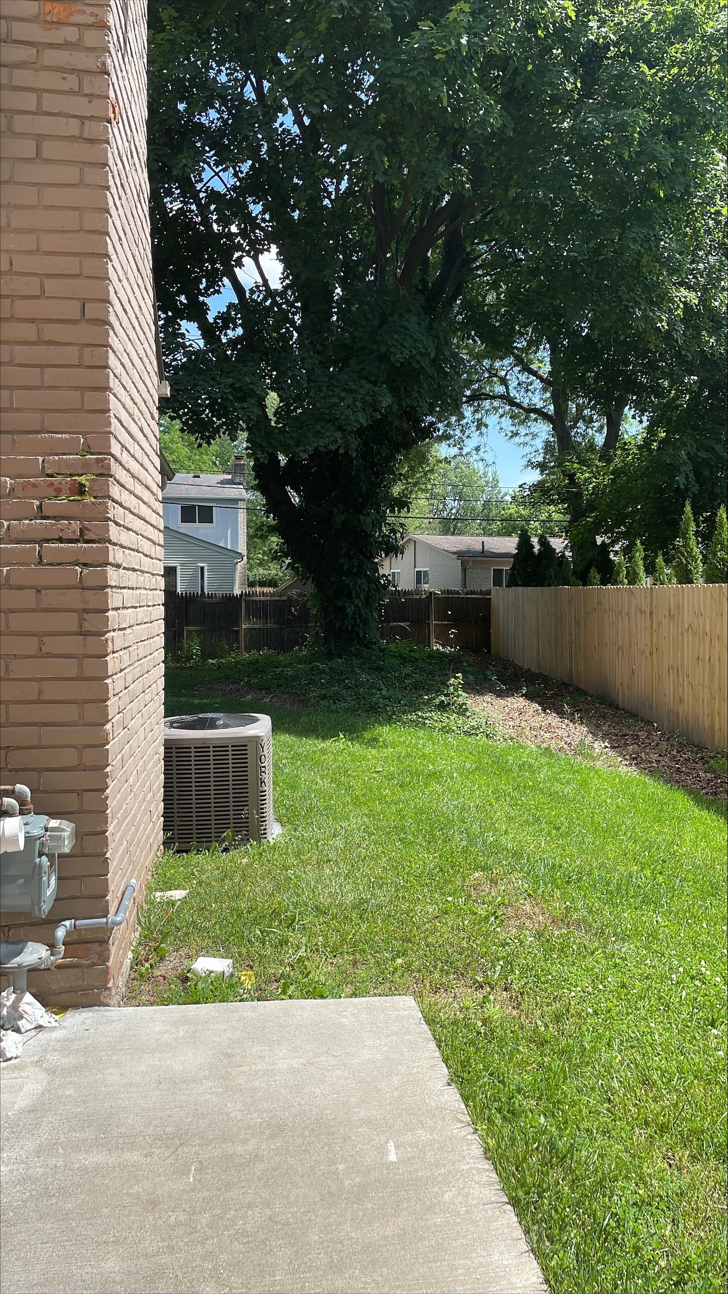 View from side of home with gas meter