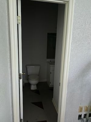 Bathroom with shower, attached to office