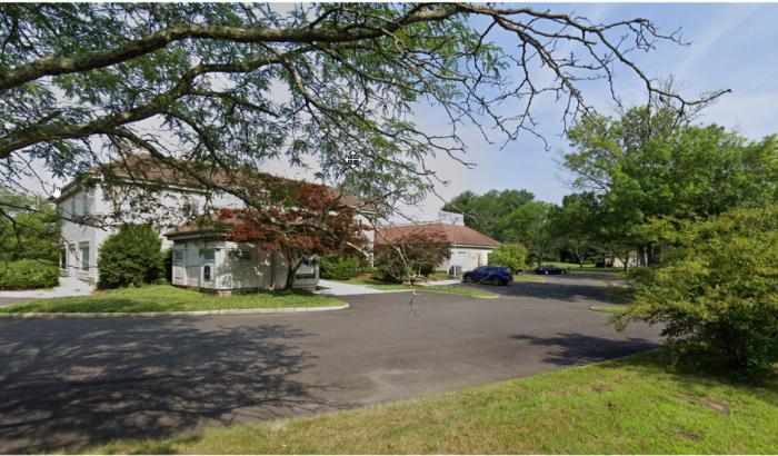 Facing into the property with Wyckoff behind the building