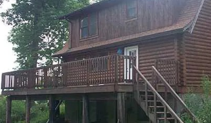 front of house with wrap around porch