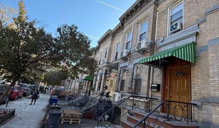 From street level the view looking past the property up the street