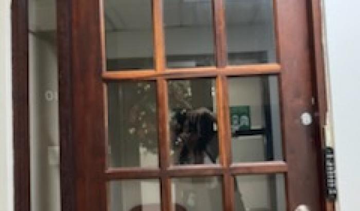 Picture of Glass door to Suite with numbers 601 identifying the Suite