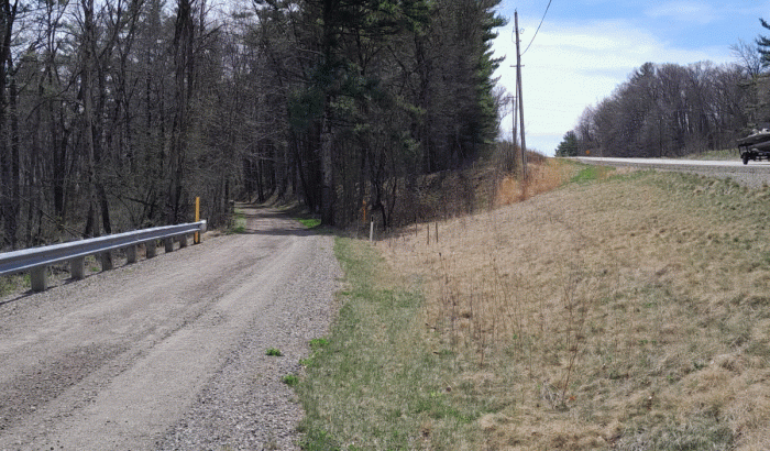 Drive going down to property