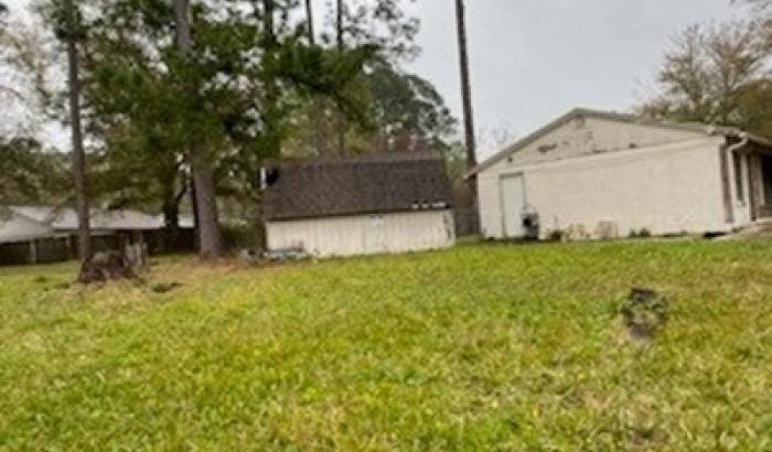 Side view of house showing shed