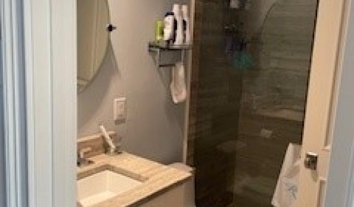 bathroom with walk in shower