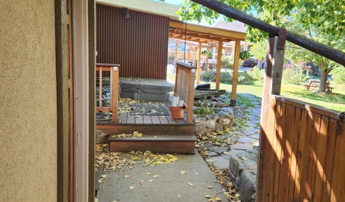 Back yard showing hot tub and part of in ground pool