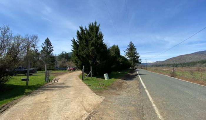 Entrance to driveway from road