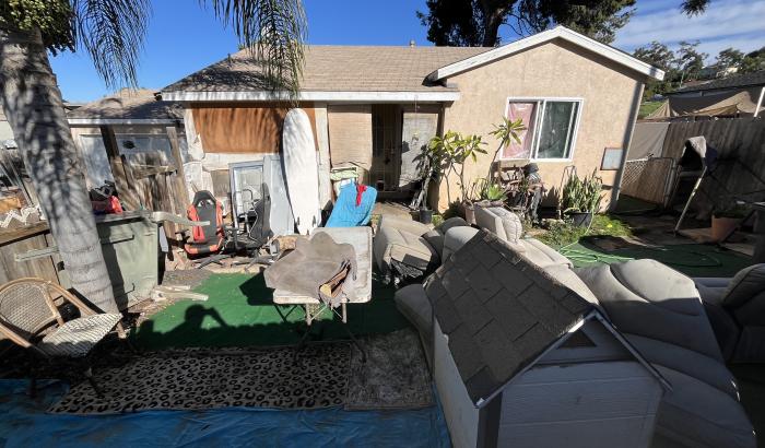 View of front of home from over fence.