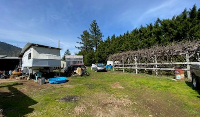 Side view of land showing fence