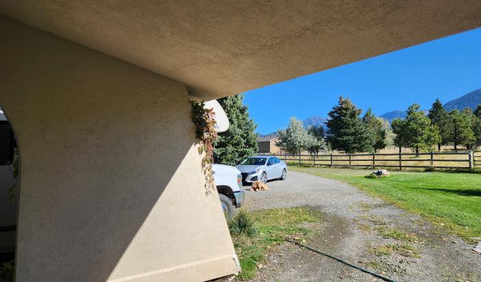 Looking to the road from under the carport