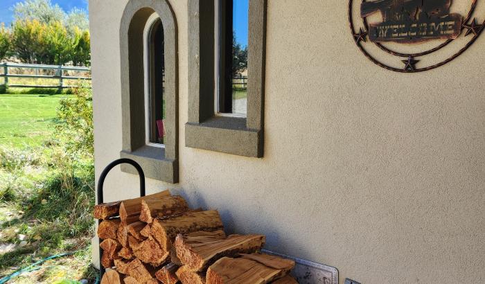 Windows on side of house under carport