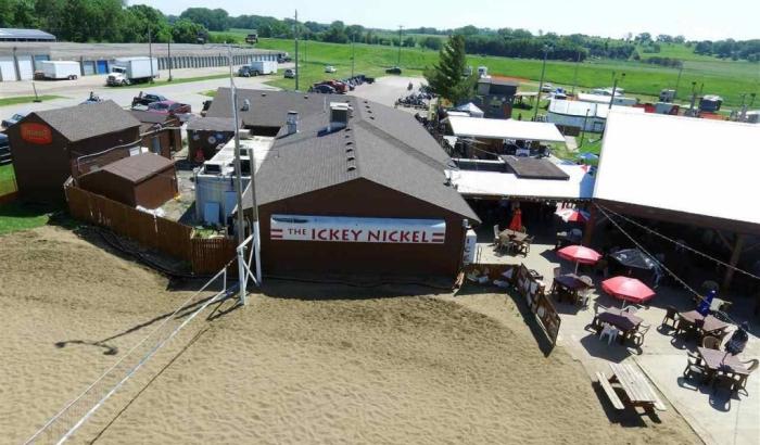 Back of building showing volleyball court