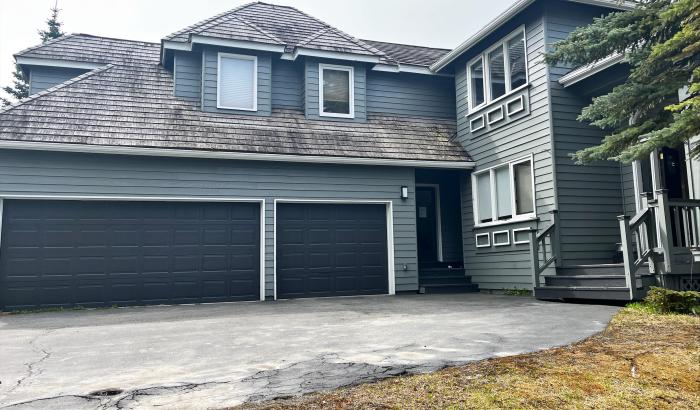 attached 2 car and 1 car garage