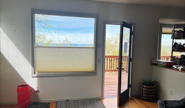 Living room 2 door to rear deck outside