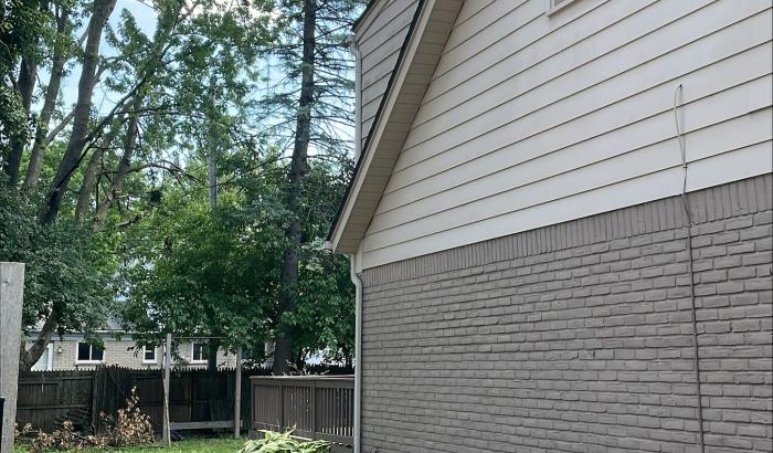 View from left side of home and fence